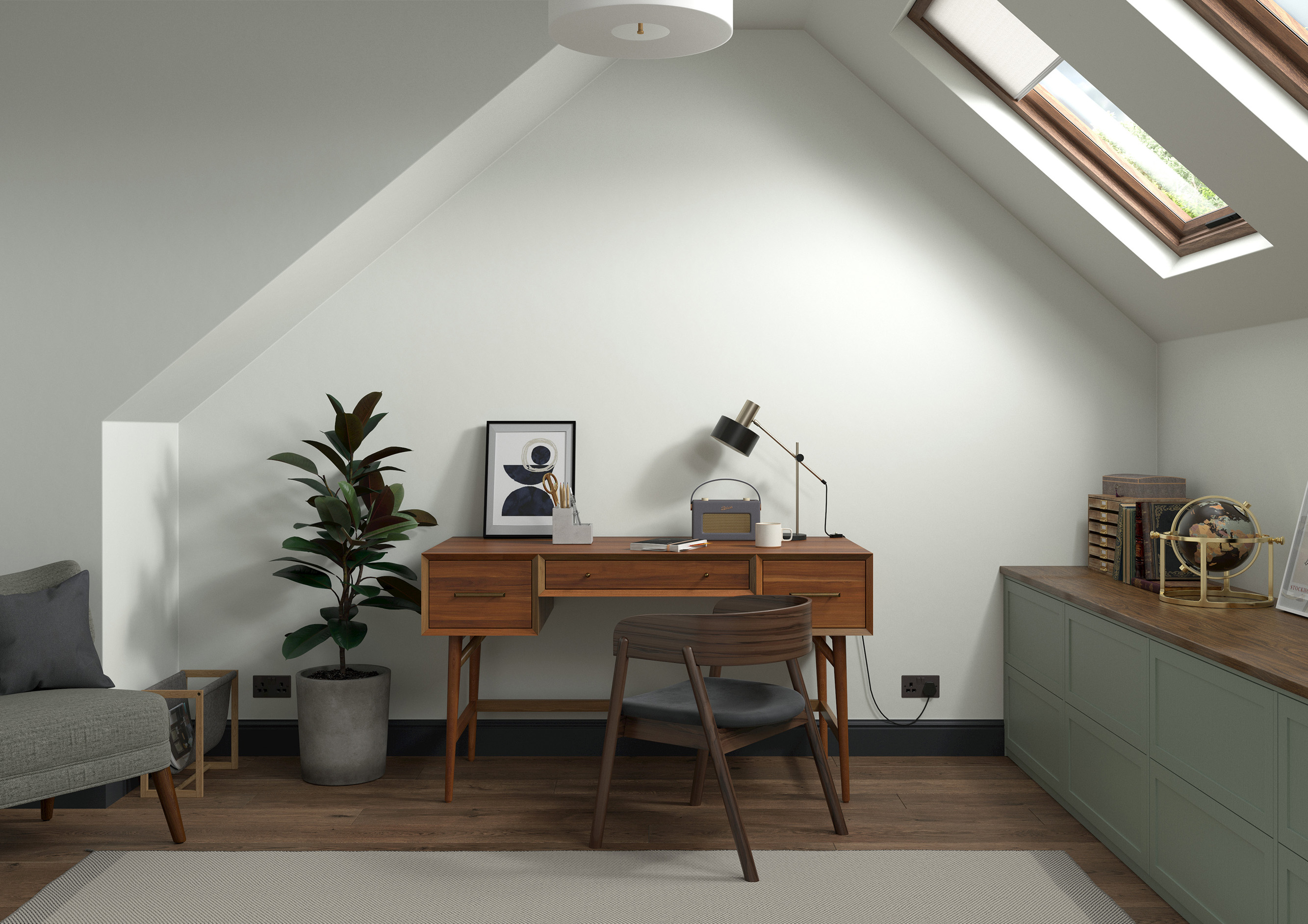 Grey kitchen cabinets against sage green walls in an attic